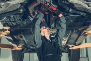 car-mechanic-fixing-car